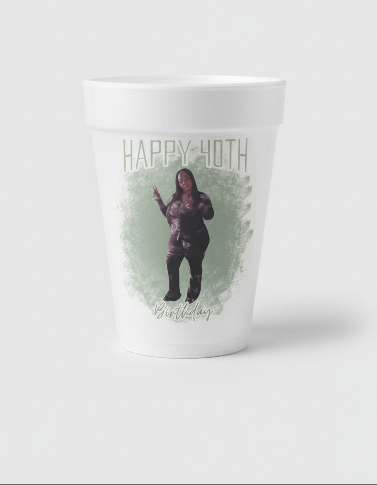 White foam cup with a printed design on a dark surface