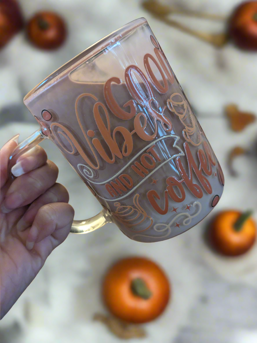 Snow globe glass mug with the illusion of coffee with whip cream