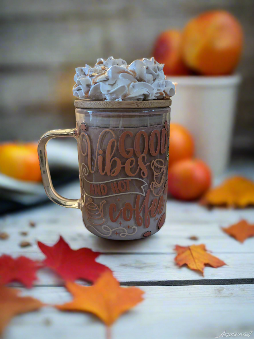 Snow globe glass mug with the illusion of coffee with whip cream